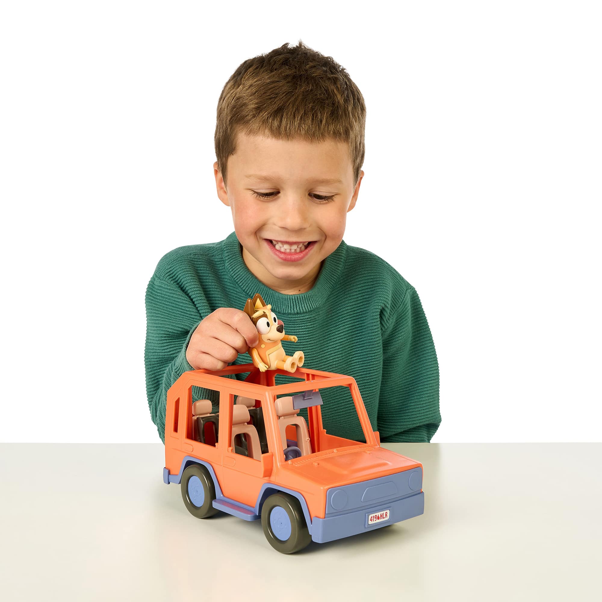 Spielzeugautos, Moose, Orange – Besonderheit: inklusive der Spielfigur Chili
