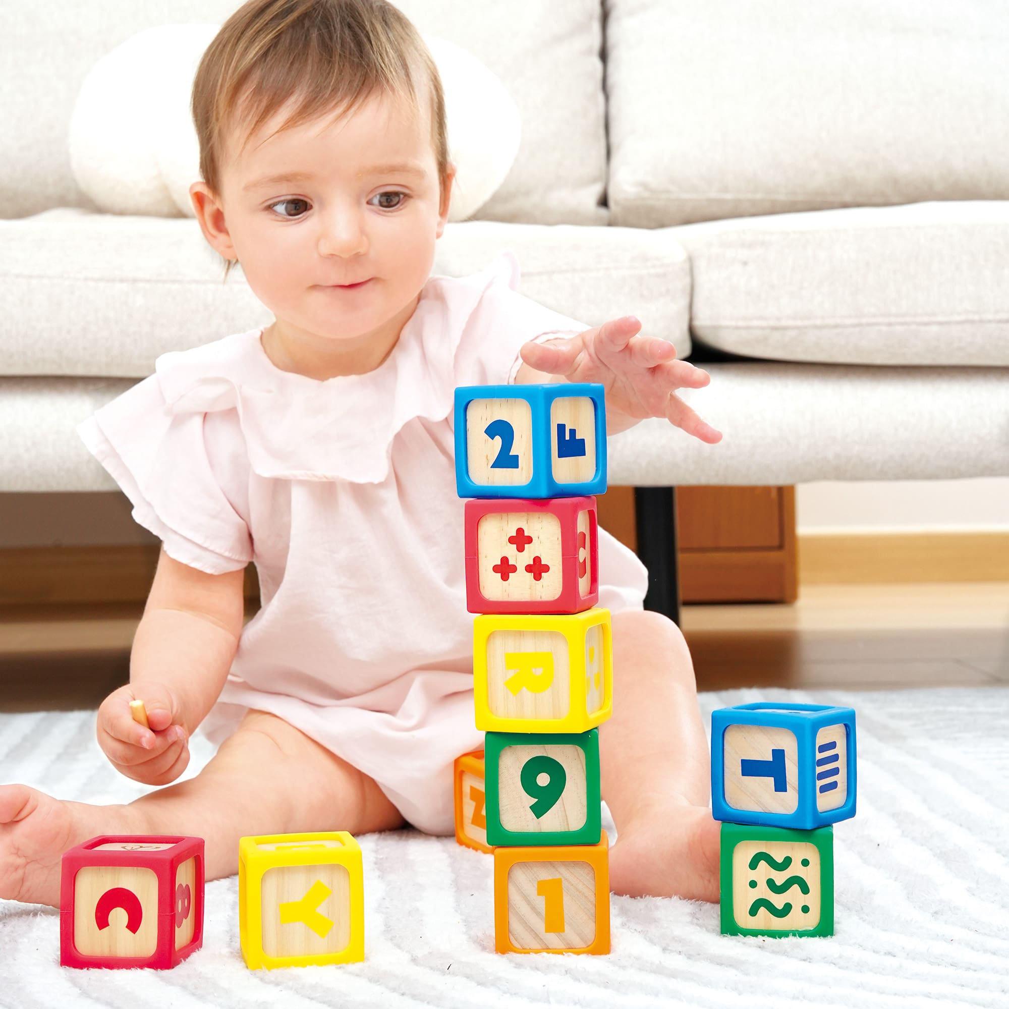 Bausteine, Hape, Mehrfarbig – Besonderheit: 10 Holzbausteine mit weichen Silikonkanten
